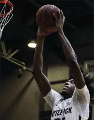  ?? Arkansas Democrat-Gazette/MITCHELL PE MASILUN UALR forward Horace Wyatt Jr. goes up for a dunk during Saturday’s loss to Central Arkansas at the Jack Stephens Center. Wyatt finished with 16 points on 5-of-7 shooting from the floor. ??