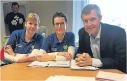  ??  ?? MSP Willie Rennie with East Neuk first responders Gillian Duncan and Emma Gilmour.