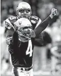  ?? AMY SANCETTA/AP ?? Adam Vinatieri kicked a game-winning field goal for the Patriots against the Rams in Super Bowl XXXVI.