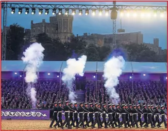  ??  ?? Members of the Armed Forces on parade to pay their respects in front of Windsor Castle