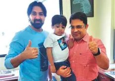  ??  ?? Mohammad with his father Mohammad Adel Kiani and doctor Dr Vivek Vij (right). Left: Mohammad wears a big smile after his surgery.