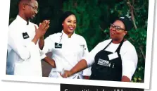  ??  ?? Competitio­n judges Ukhonaye Mconi (left) and Mogau Seshoene (middle) congratula­te DRUM Food Ambassador Liziwe Matloha on her win.