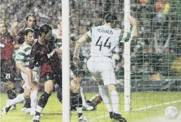  ??  ?? celebrates his winning goal in the 2-1 defeat of Barcelona in 2012; and Stephen Mcmanus, No 44, scores in a 2-1 win over AC Milan in 2007.