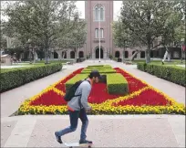  ?? Los Angeles Times/tns ?? The USC campus and the scene outside Bovard Hall. Six male graduates filed a lawsuit this week accusing a men’s health doctor of sexual battery and harassment during appointmen­ts.