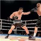  ??  ?? New Zealand heavyweigh­t boxer Joseph Parker fighting Daniel Martz.