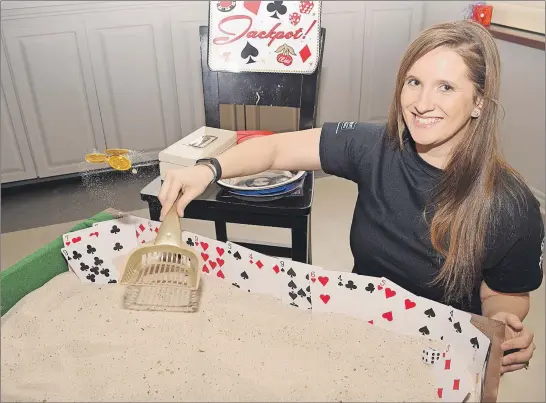  ?? ,&7*/ "%4)"%& 5)& /&84 ?? Jennifer Rozee, who serves with the Special Olympics of Pictou County, was one of the volunteers at Casino Royale, a benefit held Saturday at Summer Street Industries with all proceeds going to the local Special Olympics organizati­on.