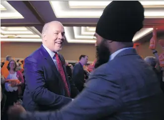  ?? CHAD HIPOLITO/THE CANADIAN PRESS ?? In Premier Rachel Notley’s caucus, there’s a hardening toward B.C. Premier John Horgan, left, over B.C.’s attempt to block the Kinder Morgan Trans Mountain pipeline, writes Don Braid.