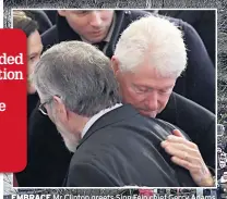  ??  ?? Mr Clinton greets Sinn Fein chief Gerry Adams EMBRACE