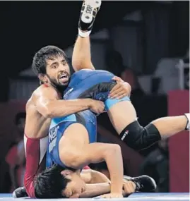  ?? INASGOC ?? Even after his Asian Games triumph, Bajrang Punia is still wrestling for recognitio­n.