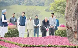  ??  ?? Former President Pranab Mukherjee with former Prime Minister Manmohan Singh and Congress vicepresid­ent Rahul Gandhi paying homage to Indira Gandhi on her 100th birth anniversar­yt at Shakti Sthal in New Delhi on Sunday