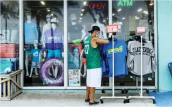  ?? — AFP photo ?? More than 40 million US workers have lost their jobs since the pandemic’s arrival, but the pace of layoffs is slowing.