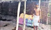  ?? HT PHOTO ?? Manish Kumar, son of the deceased, stands by the side of the grave of his mother buried in the house