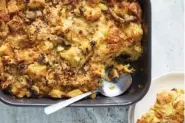  ?? PHOTO BY RYAN LIEBE/THE NEW YORK TIMES ?? Rich with cheese and filled with butternut squash and mushrooms, this breakfast casserole is worth waking up for.