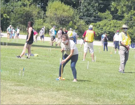  ?? BOB KEELER - MEDIANEWS GROUP ?? A Whack & Roll participan­t lines up a shot during the Aug. 30 croquet tournament. Prize money from the annual event at the Mennonite Heritage Center goes to non-profit organizati­ons.
