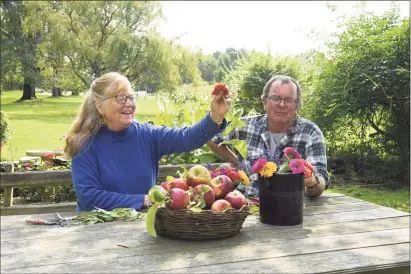  ?? H John Voorhees III / Hearst Connecticu­t Media file photo ?? Cathleen and Howard Bronson, of Maple Bank Farm in Roxbury, have donated 14 acres of family-owned land to the Roxbury Land Trust, which preserves nearly 4,000 acres of woods, farmlands and open space.