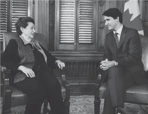  ?? SEAN KILPATRICK / THE CANADIAN PRESS ?? Prime Minister Justin Trudeau meets with Ana Maria Gordon, the only surviving Canadian passenger of the MS St. Louis, in his office Wednesday.