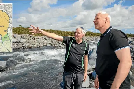  ?? ?? Taranaki Regional Council Environmen­t Services Manager Steve Ellis (left) shows Predator Free 2050 Limited chief executive Rob Forlong the new boundary at the Hangatahua (Stony) River.