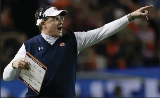  ?? AP/JOHN BAZEMORE ?? Coach Gus Malzahn got Auburn pointed in the right direction last season, and his Tigers bucked a longstandi­ng SEC trend of teams showing little or no improvemen­t after winless conference seasons when he took the Tigers from worst to first in the SEC...