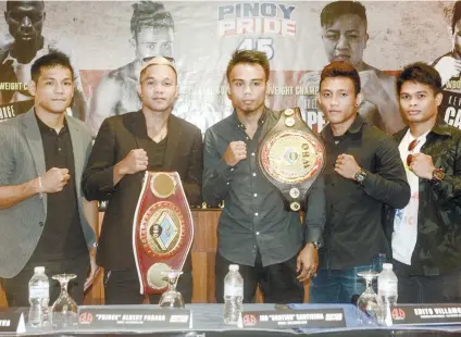  ?? SUNSTAR FOTO / ARNI ACLAO ?? YOUNG GUNS. Jeo Santisima (center) headlines Pinoy Pride 45 along with some of the most promising young pugs from the ALA Gym.