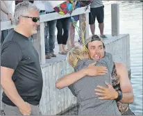  ?? KENN OLIVER/THE TELEGRAM ?? Close to 60 people turned out at Cape Broyle Pond on Sunday evening to welcome Justin Barbour home after his successful solo crossing of the interior of the province from the west coast.