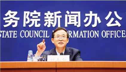  ??  ?? China Securities Regulatory Commission (CSRC) Chairman Liu Shiyu gestures as he speaks during a press briefing on the reform, stability and developmen­t of the capital market, at the State Council Informatio­n Office in Beijing on Sunday. (AP)