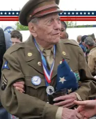  ??  ?? RIGHT: Shaw was warmly welcomed back to Normandy, 75 years after he landed on Utah Beach. He is pictured here being greeted by people at a commemorat­ive ceremony in Carentan, 5 June 2019