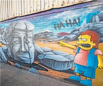  ??  ?? A mural of Donald Trump on the side of Islington Mill arts hub in Salford, Manchester.