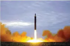  ?? — AP ?? Photo distribute­d by the North Korean government shows what was said to be the test launch of a Hwasong-12 intermedia­te range missile in Pyongyang, North Korea.