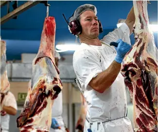  ?? PHOTO: SCOTT HAMMOND/STUFF ?? The boning room of a meat works. How long will NZ exports last when cultured beef is a fraction of the price?