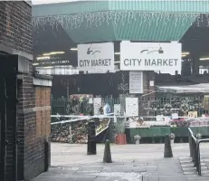  ??  ?? The police cordon closed off a significan­t part of the city centre including the market.