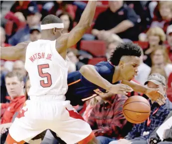  ?? AP ?? Illinois guard Trent Frazier draws a foul from Glynn Watson Jr. during the loss Sunday at Nebraska.