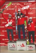  ??  ?? Tess Critchlow, left middle (1), poses on the podium following her win in women’s snowboard cross. At right, Ian Deans, left (2), holds up his ski after placing second in men’s ski cross at the Sport Chek National Championsh­ips hosted by Big White.