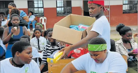  ?? Picture: SUPPLIED ?? REACHING OUT: The "#Keepagirli­nschool sanitary pad drive kicked off at Ulwazi secondary school in Mdantsane yesterday, thanks to an initiative by Sinovuyo Mzongwana and a few friends