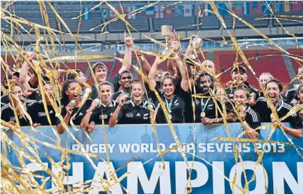  ?? Photo: GETTY IMAGES ?? Winners are grinners: The New Zealand men’s and women’s sevens teams celebrate after lifting the titles at the Rugby World Cup Sevens in Moscow yesterday. New Zealand men beat England 33-0 in the final, while the women downed Canada 29-12.