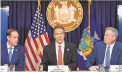  ?? ANGELA WEISS/AFP VIA GETTY IMAGES ?? State health chief Howard Zucker (left) defended moves by Gov. Cuomo when questioned about coronaviru­s spread in nursing homes.