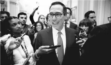  ?? — Reuters photo ?? US Secretary of the Treasury Steven Mnuchin departs from a meeting on tax reform on Capitol Hill in Washington. US President Donald Trump will release a tax plan stating broad principles and proposing some deep cuts, mostly for businesses, including a...