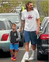  ??  ?? When this youngster got a bit overwhelme­d at the Steven Adams basketball camp, his hero came and fetched him.