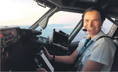  ??  ?? FLYING HIGH. Denise Luppnow is flying a Boeing 737 as first officer in a male-dominated world.