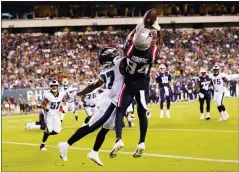  ?? CHRIS SZAGOLA - THE ASSOCIATED PRESS ?? New England Patriots’ Kendrick Bourne can’t make the catch in front of Philadelph­ia Eagles’ Zech McPhearson during the first half of a preseason NFL football game Thursday, Aug. 19, 2021, in Philadelph­ia.