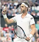  ??  ?? Making his point: Marcus Willis during his match with Roger Federer