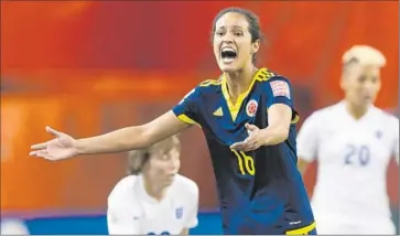  ?? Minas Panagiotak­is
Getty I mages ?? LADY ANDRADE of Colombia, who was suspended in 2012 when she punched American Abby Wambach in the eye, predicted the Colombians would earn their respect by beating the second- ranked Americans.