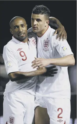  ?? Picture: Reuters ?? Jermain defoe, left, celebrates his second goal and England’s eighth with Kyle Walker as England strolled past San Marino in Serravalle