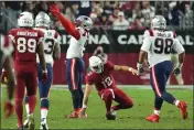  ?? ROSS D. FRANKLIN — THE ASSOCIATED PRESS ?? New England Patriots linebacker Matthew Judon (9) celebrates after sacking Arizona Cardinals quarterbac­k Colt McCoy (12) during the second half Monday in Glendale, Ariz.