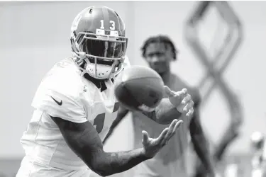  ?? Associated Press ?? n New York Giants wide receiver Odell Beckham works out Aug. 8 during NFL football training camp in East Rutherford, N.J. While the Cowboys could take a step back, perhaps several if sizzling RB Ezekiel Elliott has to sit out all six games of his...