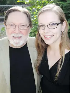  ??  ?? Retiring Vancouver Chamber Choir conductor Jon Washburn welcomed mezzo-soprano Dinah Ayre, who performed at a fundraisin­g banquet.