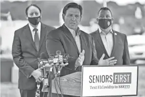  ?? CHRIS O’MEARA/AP ?? DeSantis accuses his political opponents of spreading accusation­s of vaccine favoritism, though Republican­s have expressed concerns.