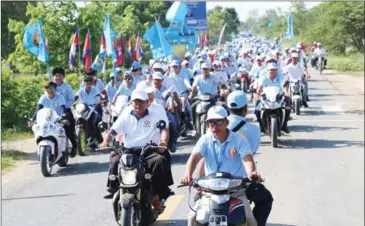  ?? FACEBOOK ?? CPP supporters campaign on motorbikes last month in Takeo province. Six CNRP members were summonsed yesterday at the Takeo Provincial Court over a confrontat­ion between rival political rallies in the province’s Prey Khla commune.