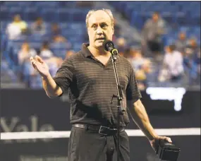  ?? Tyler Sizemore / Hearst Connecticu­t Media ?? New Haven Register UConn football beat reporter Jim Fuller accepts the 2018 Dave Solomon Media Award at the 2018 Connecticu­t Open at the Connecticu­t Tennis Center at Yale in New Haven on Thursday.