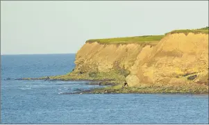  ??  ?? Participan­ts in the Schooner Cove Surf Classic are hoping for rougher seas than are shown in this recent photo of the ocean waters near the cliffs of Donkin, where the inaugural competitio­n will take place sometime in early October.