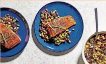  ?? [PHOTO BY STACY ZARIN GOLDBERG, FOR THE WASHINGTON POST] ?? Seared Salmon With Corn-Black Bean Salad